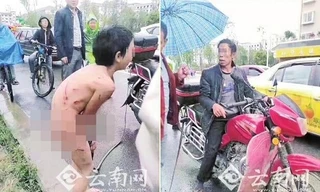 Cậu bé 12 tuổi khóc và run rẩy vì lạnh. Ảnh: Yunnan.cn.