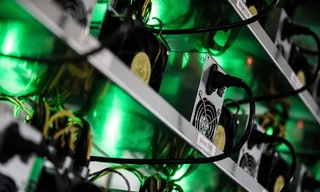 Đào NEM không cần máy tính cấu hình mạnh như Bitcoin. Ảnh: Bloomberg