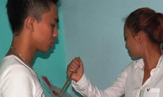 Ánh thực nghiệm lại việc gây án. Ảnh: Công an TP HCM