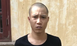 Đối tượng Nguyễn Đức Vinh tại cơ quan công an