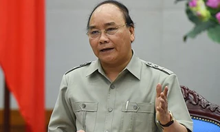 Thủ tướng Nguyễn Xuân Phúc chỉ đạo tập trung lực lượng, tìm bằng được phi công máy bay Su-30 MK2 mất tích là thượng tá Trần Quang Khải. Ảnh: VGP.