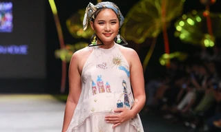 Phan Như Thảo bế bụng bầu đi catwalk