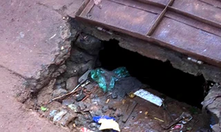 Nữ sinh Bình Phước bị nước mưa cuốn vào miệng cống mất tích