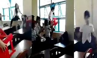 Nữ sinh Trà Vinh đánh nhau, khiến một nữ sinh bị u não, điếc 1 tai.(Ảnh cắt từ clip) 