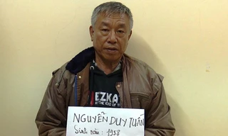 Nguyễn Duy Tuấn tại cơ quan công an.