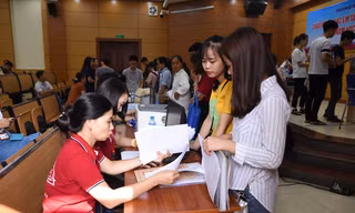 Thí sinh nhập học tại một trường ĐH năm 2018Ảnh: Nghiêm Huê