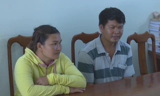 Cặp vợ chồng Hòa và Chánh tại cơ quan điều tra