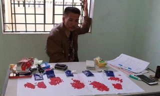 Đối tượng Lộc và tang vật tại cơ quan công an. Ảnh: T.L