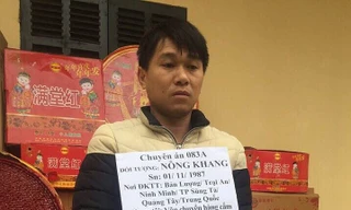 Đối tượng Khang và tang vật. Ảnh: Duy Chiến