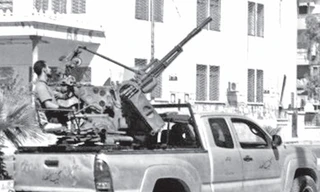 Tổng thống Assad tại vị: Âu - Mỹ lo, Iran mừng