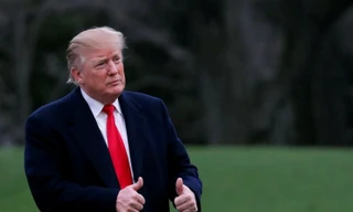 Phản ứng của ông Trump khi nghe kết luận của cuộc điều tra. (Ảnh: Carlos Barria)