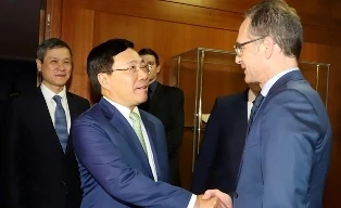 Phó Thủ tướng Phạm Bình Minh và Bộ trưởng Ngoại giao Đức Heiko Maas. (Ảnh: BNG)
