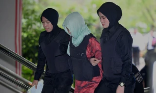 Đoàn Thị Hương xuất hiện tại tòa. Ảnh: AFP