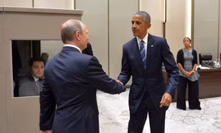 Tổng thống Nga Putin (trái) và người đồng cấp Mỹ Obama vừa có cuộc gặp kéo dài hơn 1 giờ đồng hồ tại Hàng Châu, Trung Quốc. Ảnh: Tân Hoa Xã