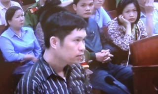 Nguyễn Mạnh Tường tại phiên xử ngày 14/4/2014.