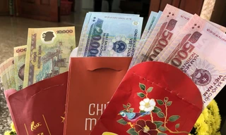 Cha mẹ giữ hộ tiền lì xì của con nhưng không trả liệu có bị phạt?