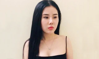 Vũ Thị Vân Anh tại cơ quan công an.