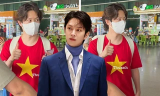 Heechul SUJU mặc áo thun cờ đỏ sao vàng, bất ngờ xuất hiện tại TP.HCM 