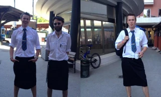 Nam lái tàu mặc váy đi làm