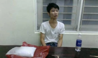 Hoàng Thế Mạnh khi bị bắt cùng tang vật.