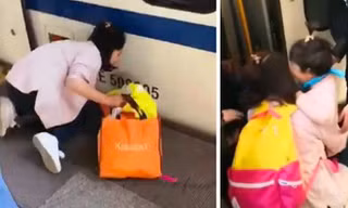 Mẹ mải mê dùng điện thoại, con gái rơi xuống gầm tàu cao tốc