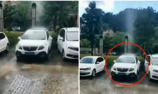 Mưa chỉ trút xuống đúng một chiếc ô tô trong bãi đậu xe đông đúc, có phải "lỗi do ăn ở"?