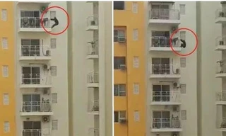 Một người Ấn Độ tập thể dục bằng cách đu bên ngoài ban-công tầng 12, ai nhìn cũng hoảng