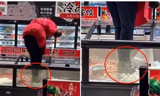 Nhân viên siêu thị Trung Quốc trèo vào tủ đông, giẫm giày lên thực phẩm gây phẫn nộ