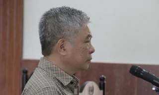 Nguyên phó Thống đốc Đặng Thanh Bình tại tòa chiều nay. Ảnh: Tân Châu