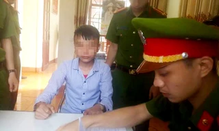 Nghi phạm Lê Bá Khánh Trình tại CQĐT.