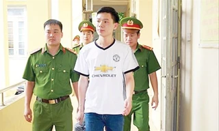 Bác sỹ Hoàng Công Lương hôm bị bắt tạm giam.