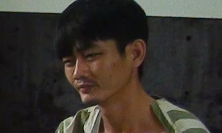 Minh tại cơ quan điều tra. Ảnh CAND. 