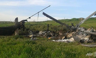 Hiện trường một chiếc trực thăng của Azerbaijan bị bắn rơi trên khu vực Armenia kiểm soát. (Ảnh: AFP)