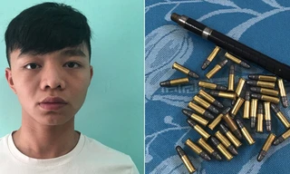 Trần Đức Huy và tang vật.