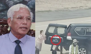 Xe biển xanh của ông Sơn vàn sân bay đón con.