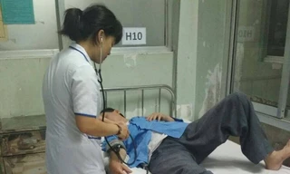 Ông Trần Đình Sang bị đánh phải nằm viện để điều trị.