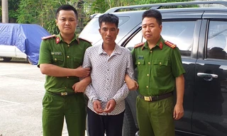 Cơ quan Công an dẫn giải đối tượng Nguyễn Tiến Giảng 