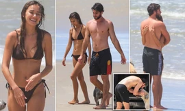 Liam Hemsworth tình tứ bạn gái người mẫu ở biển