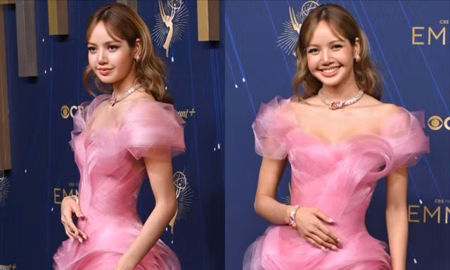 Clip Lisa tạo dáng với Glambot trên thảm đỏ Emmy 2025 có gì mà “viral”?