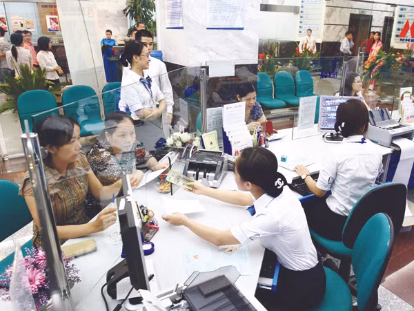 Nhiều ngân hàng vẫn lãi lớn giữa lúc các doanh nghiệp lao đao Ảnh minh họa: Hồng Vĩnh