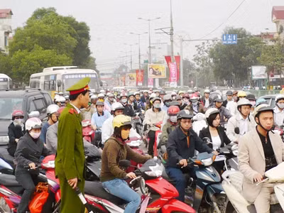 Đóng phí xe máy như… thuế đất phi nông nghiệp