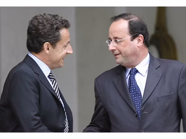 Tổng thống Nicolas Sarkozy (trái) và ứng viên Francois Hollande Ảnh: Paris Match