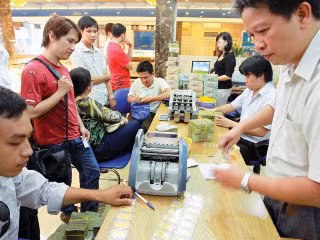 Giá vàng và trò chơi chữ
