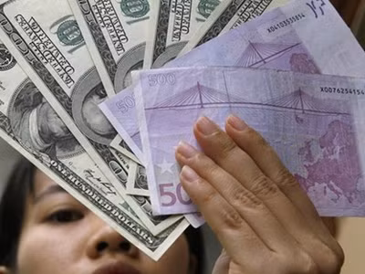 Xem xét rút đề xuất 'cấm' tặng, cho ngoại tệ