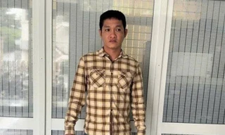 Vinh tại cơ quan công an.