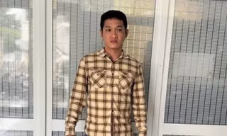 Vinh tại cơ quan công an.