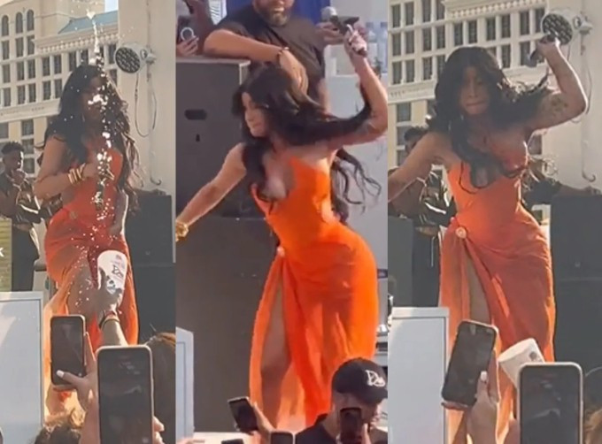 Cardi B đã ném micro về phía người hâm mộ sau khi bị tạt nước. Cardi B đã ném micro về phía người hâm mộ sau khi bị tạt nước.