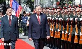 Lễ đón trọng thể Tổng Bí thư Tô Lâm và Phu nhân tại Vientiane