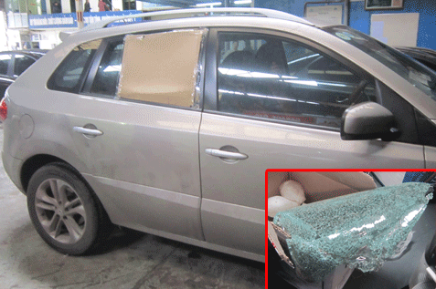 Chiếc Koleos bị phá kính trộm tài sản. Ảnh: Lường Toán