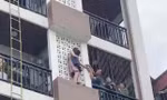 Hà Nội: Giải cứu cô gái trèo ra ngoài tầng cao ngôi nhà